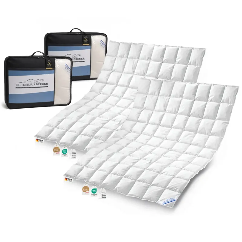 2 Bettdecken 135x200 mit zwei Taschen gefuellt mit leichten Daunen und Federn deshlb eine Sommerbettdecke