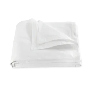 Matouk Ceylon duvet cover in white cotton with satin stitch border, neatly folded.