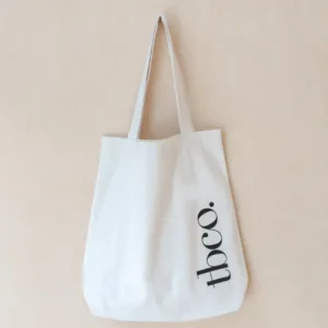TBCo Recycled Cotton Tote in Ecru with long handles and brand logo, made from durable canvas in off-white colour