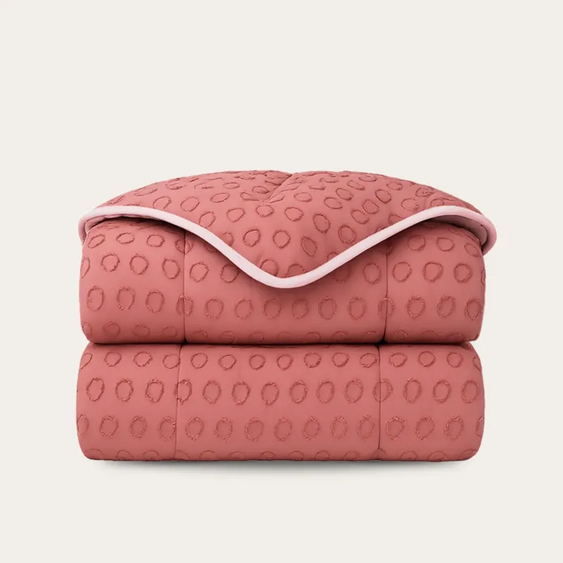 Luxe HappyBed dekbed in roze met tufted cirkeldesign, hypoallergeen en geschikt voor alle seizoenen