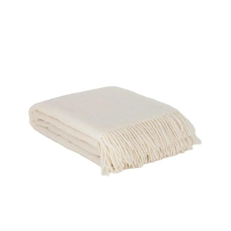 Folded Wool Bouclé Throw Blanket Paris in white, showing textured knit